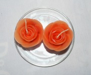 2 x Orange Rose Candles on a Glass Plate